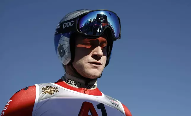 Switzerland's Marco Odermatt concentrates ahead of a men's downhill training, at the Alpine Ski World Championships, in Saalbach-Hinterglemm, Austria, Wednesday, Feb. 5, 2025. (AP Photo/Gabriele Facciotti)