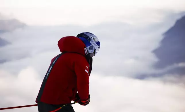 Switzerland's Marco Odermatt is seen ahead of an alpine ski, men's World Cup downhill training, in Garmisch-Partenkirchen, Germany, Saturday, Feb. 1, 2025. (AP Photo/Gabriele Facciotti)