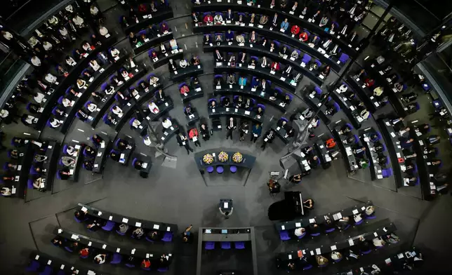 FILE - In this Thursday, Jan. 17, 2019 file photo German lawmakers attend a special parliament session at the Reichstag building, host of the German federal parliament, Bundestag, in Berlin, Germany. (AP Photo/Markus Schreiber, File)