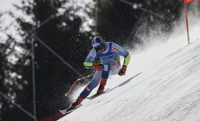 Norway's Adrian Smiseth Sejersted speeds down the course during a men's Super-G, at the Alpine Ski World Championships, in Saalbach-Hinterglemm, Austria, Friday, Feb. 7, 2025. (AP Photo/Gabriele Facciotti)