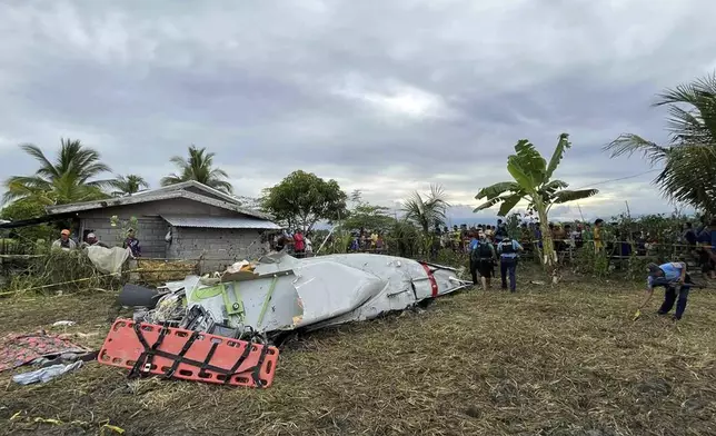 Wreckage of airplane in a rice field in Maguindanao del Sur province, Philippines, after officials say a U.S. military-contracted plane has crashed in a rice field in the southern Philippines, killing all four people on board, on Thursday Feb. 6, 2025. (Sam Mala/UGC via AP)