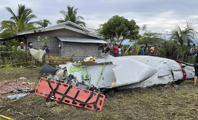 Wreckage of airplane in a rice field in Maguindanao del Sur province, Philippines, after officials say a U.S. military-contracted plane has crashed in a rice field in the southern Philippines, killing all four people on board, on Thursday Feb. 6, 2025. (Sam Mala/UGC via AP)