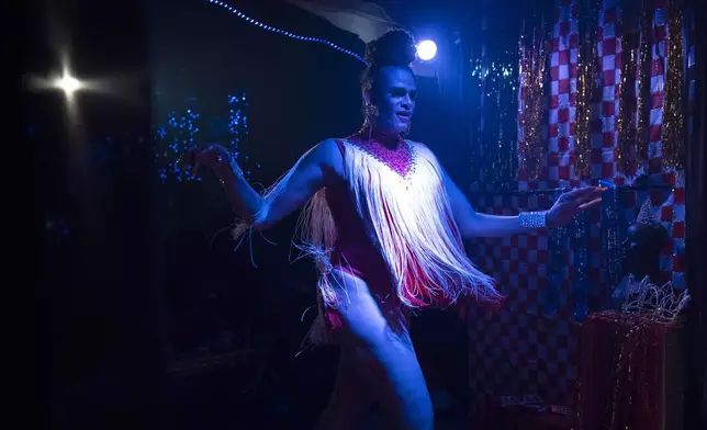 Transgender woman Alessandra Salazary, 31, hosts a Carnival contest in Rio de Janeiro, Sunday, Feb. 16, 2025. (AP Photo/Silvia Izquierdo