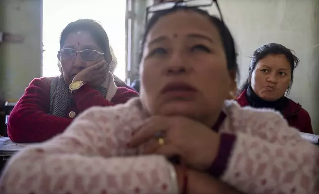 Women attend a class at the Ujyalo Community learning center in Kathmandu, Nepal, Feb. 6, 2025. (AP Photo/Niranjan Shrestha)