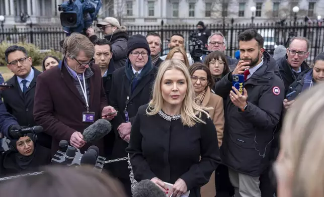 White House press secretary Karoline Leavitt speaks with reporters at the White House, Thursday, Feb. 6, 2025, in Washington. (AP Photo/Alex Brandon)