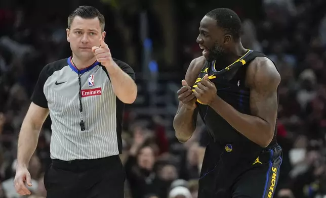 Golden State Warriors forward Draymond Green, right, argues with a call during the first half of an NBA basketball game against the Chicago Bulls, Saturday, Feb. 8, 2025, in Chicago. (AP Photo/Erin Hooley)
