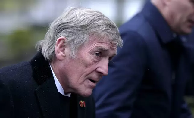 Kenny Dalglish arrives at Manchester Cathedral for the funeral of former Manchester United, Manchester City and Scotland forward Denis Law, in Manchester, England, Tuesday, Feb. 11, 2025. (Martin Rickett/PA via AP)