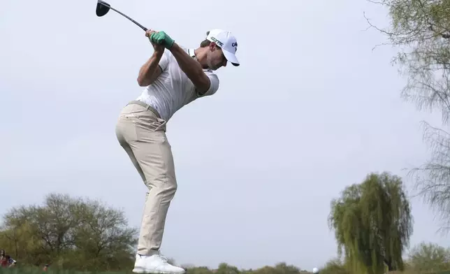 Thomas Detry, of Belgium, hits his tee shot on the third hole during the final round of the Phoenix Open golf tournament at TPC Scottsdale Sunday, Feb. 9, 2025, in Scottsdale, Ariz. (AP Photo/Ross D. Franklin)