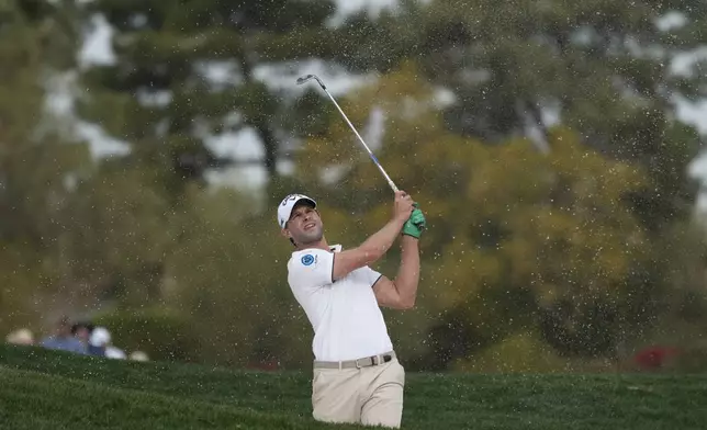 Thomas Detry, of Belgium, hits out of a fairway bunker at the second hole during the final round of the Phoenix Open golf tournament at TPC Scottsdale Sunday, Feb. 9, 2025, in Scottsdale, Ariz. (AP Photo/Ross D. Franklin)