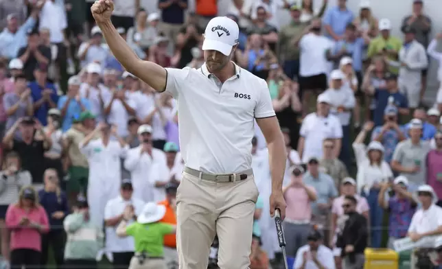 Thomas Detry, of Belgium, pumps his fist after sinking a birdie putt on the 18th hole to win the Phoenix Open golf tournament at TPC Scottsdale, Sunday, Feb. 9, 2025, in Scottsdale, Ariz. (AP Photo/Ross D. Franklin)
