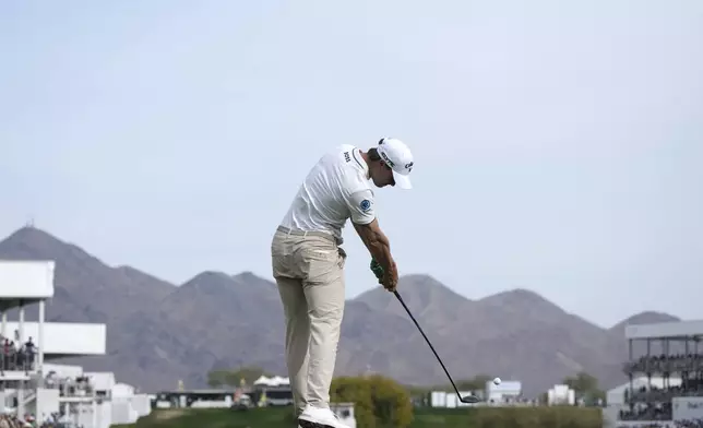 Thomas Detry, of Belgium, hits his tee shot on the 17th hole during the final round of the Phoenix Open golf tournament at TPC Scottsdale, Sunday, Feb. 9, 2025, in Scottsdale, Ariz. (AP Photo/Ross D. Franklin)