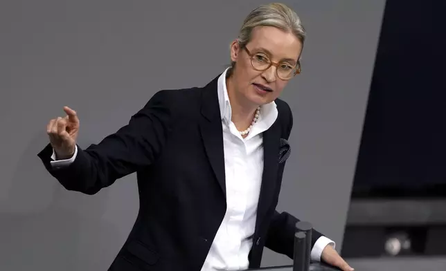 FILE —Leader of right wing AfD Alice Weidel speaks during a plenary session at the German parliament Bundestag where he faces a vote of confidence, Berlin, Germany, Dec. 16, 2024. (AP Photo/Markus Schreiber)