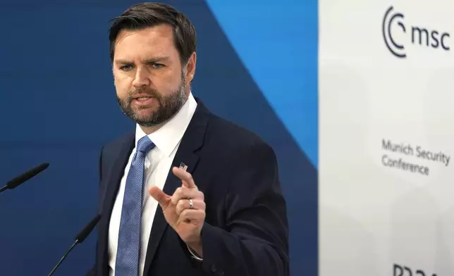 United States Vice-President JD Vance addresses the audience during the Munich Security Conference at the Bayerischer Hof Hotel in Munich, Germany, Friday, Feb. 14, 2025. (AP Photo/Matthias Schrader)