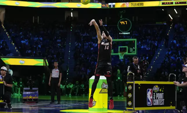 Miami Heat guard Tyler Herro shoots during the 3-point contest at the NBA basketball All-Star Saturday night festivities Saturday, Feb. 15, 2025, in San Francisco. (AP Photo/Godofredo A. Vásquez)