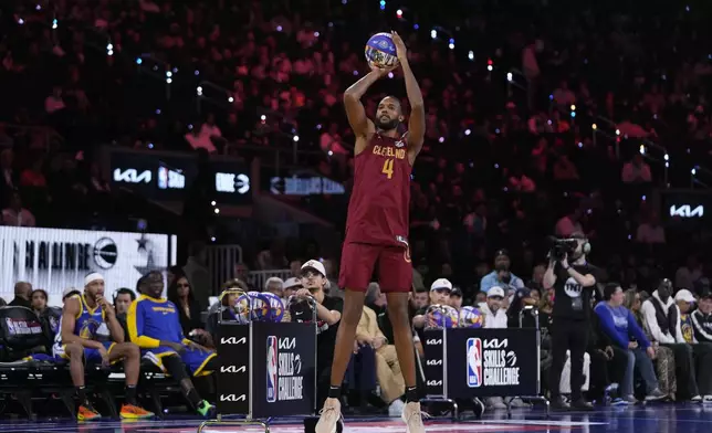 Cleveland Cavaliers center Evan Mobley competes during the skills challenge at the NBA basketball All-Star Saturday night festivities Saturday, Feb. 15, 2025, in San Francisco. (AP Photo/Godofredo A. Vásquez)