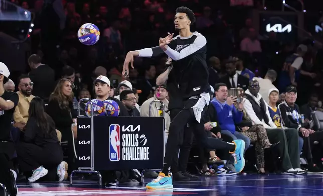 San Antonio Spurs Center Victor Wembanyama competes during the skills challenge at the NBA basketball All-Star Saturday night festivities Saturday, Feb. 15, 2025, in San Francisco. (AP Photo/Godofredo A. Vásquez)