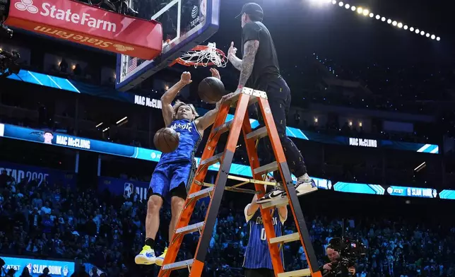 Orlando Magic guard Mac McClung dunks during the slam dunk contest at the NBA basketball All-Star Saturday night festivities Saturday, Feb. 15, 2025, in San Francisco. (AP Photo/Godofredo A. Vásquez)