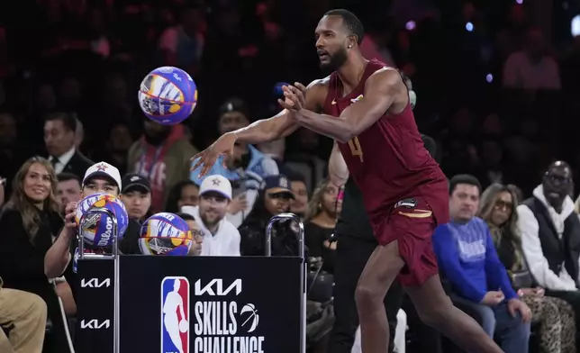 Cleveland Cavaliers center Evan Mobley competes during the skills challenge at the NBA basketball All-Star Saturday night festivities Saturday, Feb. 15, 2025, in San Francisco. (AP Photo/Godofredo A. Vásquez)