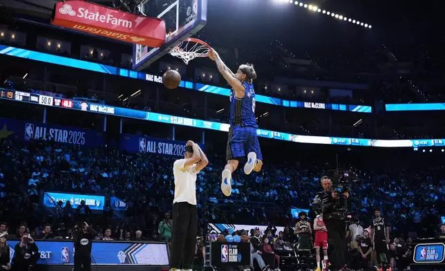 Orlando Magic guard Mac McClung dunks during the slam dunk contest at the NBA basketball All-Star Saturday night festivities Saturday, Feb. 15, 2025, in San Francisco. (AP Photo/Godofredo A. Vásquez)