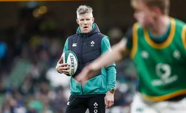 Ireland's interim coach Simon Easterby watches as his team warms-up before the Six Nations rugby union match between Ireland and England at the Aviva Stadium in Dublin, Saturday, Feb. 1, 2025. (AP Photo/Peter Morrison)