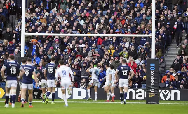 Italy's Juan Ignacio Brex (centre) after scoring a try during the Six Nations rugby union match between Scotland and Italy, at Murrayfield Stadium, Edinburgh, Scotland, Saturday Feb. 1, 2025. (Andrew Milligan/PA via AP)