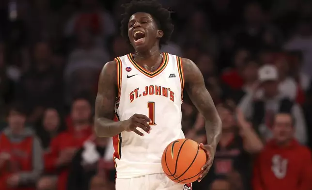 St. John's guard Kadary Richmond (1) dribbles the ball during the second half of an NCAA college basketball game against Providence Saturday, Feb. 1, 2025, in New York. (AP Photo/Pamela Smith)