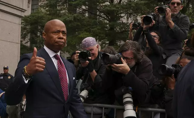 FILE - New York City mayor Eric Adams departs Manhattan federal court after an appearance, Friday, Sept. 27, 2024, in New York. (AP Photo/Yuki Iwamura, File)