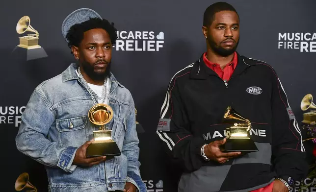 Kendrick Lamar , left, and Dave Free pose in the press room with the award for best music video for "Not Like Us," during the 67th annual Grammy Awards on Sunday, Feb. 2, 2025, in Los Angeles. (Photo by Richard Shotwell/Invision/AP)