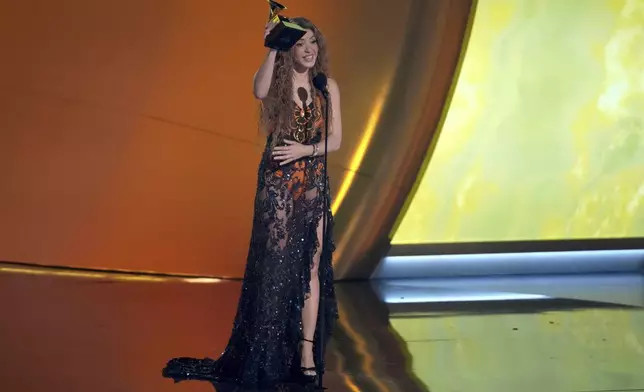 Shakira accepts the award for best latin pop album for "Las Mujeres Ya No Lloran" during the 67th annual Grammy Awards on Sunday, Feb. 2, 2025, in Los Angeles. (AP Photo/Chris Pizzello)