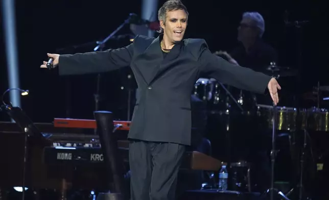 Justin Tranter speaks during the 67th annual Grammy Awards on Sunday, Feb. 2, 2025, in Los Angeles. (AP Photo/Chris Pizzello)