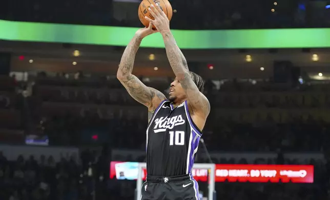 Sacramento Kings forward DeMar DeRozan looks to shoot during the first half of an NBA basketball game against the Oklahoma City Thunder, Saturday, Feb. 1, 2025, in Oklahoma City. (AP Photo/Kyle Phillips)