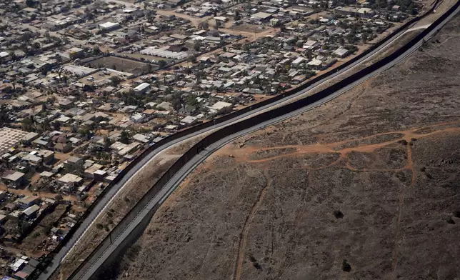 The U.S. Border with Mexico is seen in an aerial view Friday, Jan. 31, 2025, near San Diego. (AP Photo/Jae C. Hong)