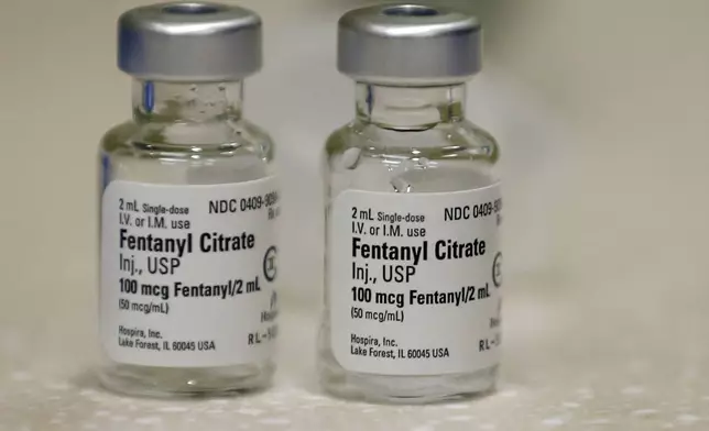 FILE - Small vials of fentanyl are shown in the inpatient pharmacy at the University of Utah Hospital in Salt Lake City, June 1, 2018. (AP Photo/Rick Bowmer, File)