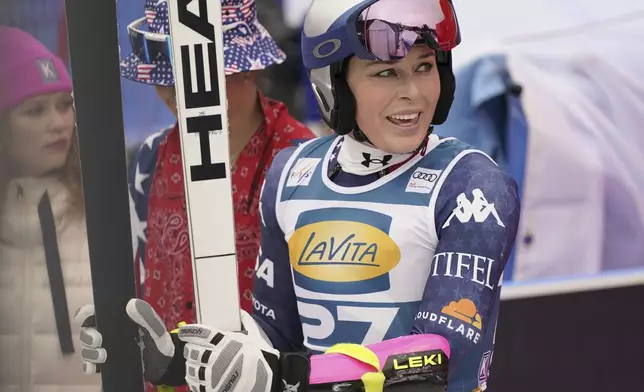 United States' Lindsey Vonn reacts after completing an alpine ski, women's World Cup super G, in Garmisch, Germany, Sunday, Jan. 26, 2025. (AP Photo/Piermarco Tacca)