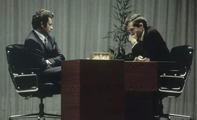 FILE - Bobby Fischer, right, and Boris Spassky play their last game together in Reykjavik, Iceland, Aug. 31, 1972. (AP Photo/J. Walter Green, File)