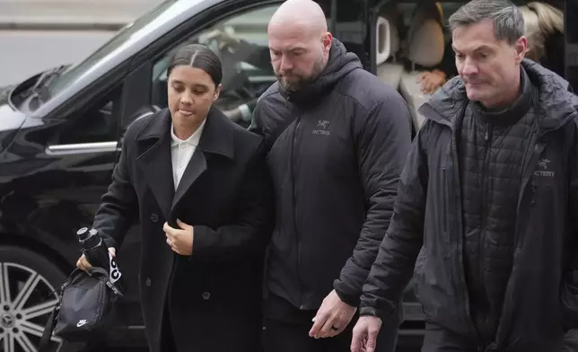 Chelsea and Australia soccer player Samantha Kerr arrives at Kingston Crown Court, in south west London, Tuesday, Feb. 11, 2025, where she is charged with alleged racially aggravated harassment of a police officer. (AP Photo/Kin Cheung)