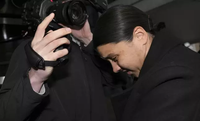 Chelsea and Australia soccer player Samantha Kerr arrives at Kingston Crown Court, in south west London, Tuesday, Feb. 11, 2025, where she is charged with alleged racially aggravated harassment of a police officer. (AP Photo/Kin Cheung)