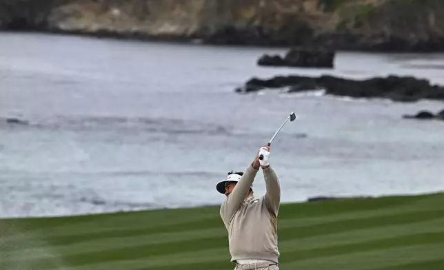 Jason Day of Australia hits from a fairway bunker on the 10th hole at Pebble Beach Golf Links during the second round of the AT&amp;T Pebble Beach Pro-Am golf tournament, Friday, Jan. 31, 2025, in Pebble Beach, Calif. (AP Photo/Nic Coury)