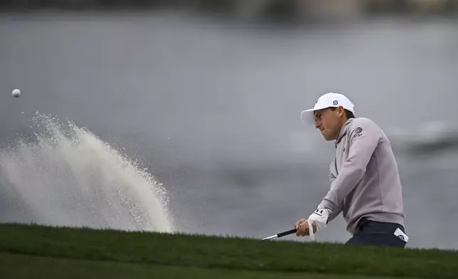 Jordan Spieth hits from a bunker on the sixth hole at Pebble Beach Golf Links during the second round of the AT&amp;T Pebble Beach Pro-Am golf tournament, Friday, Jan. 31, 2025, in Pebble Beach, Calif. (AP Photo/Nic Coury)