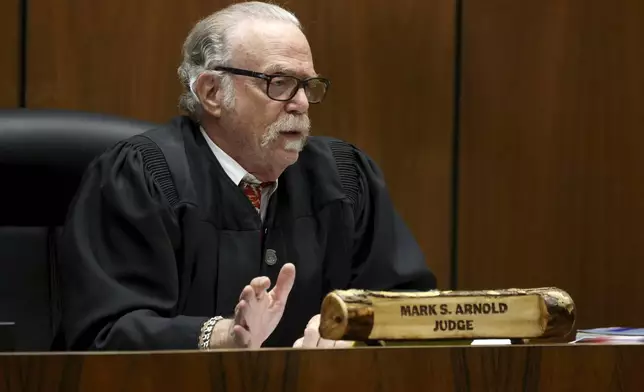 Judge Mark S. Arnold speaks to attorneys before opening remarks in the trial of Rakim Mayers, aka A$AP Rocky, at the Clara Shortridge Foltz Criminal Justice Center in downtown Los Angeles, Friday, Jan. 24, 2025. (Genaro Molina/Los Angeles Times via AP, Pool)