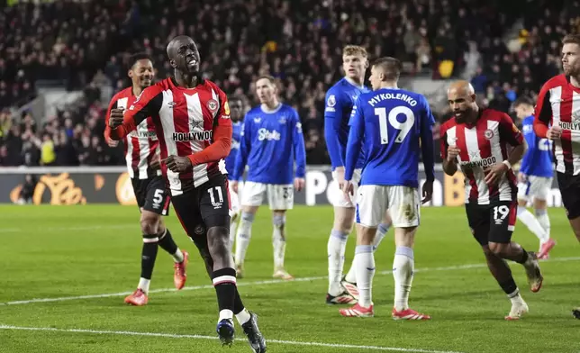 Brentford's Yoane Wissa celebrates scoring his side's first goal of the gamel, during the English Premier League soccer match between Brentford and Everton at Gtech Community Stadium, in London, Wednesday, Feb. 26, 2025. (Adam Davy/PA via AP)