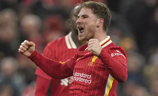Liverpool's Alexis Mac Allister celebrates after scoring his side's second goal during the English Premier League soccer match between Liverpool and Newcastle United at Anfield in Liverpool, Wednesday, Feb. 26, 2025. (AP Photo/Jon Super)