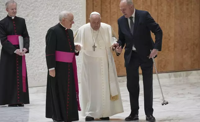 Pope Francis arrives for a Jubilee audience in the Pope Paul VI hall at the Vatican, Saturday, Feb. 1, 2025. (AP Photo/Andrew Medichini)