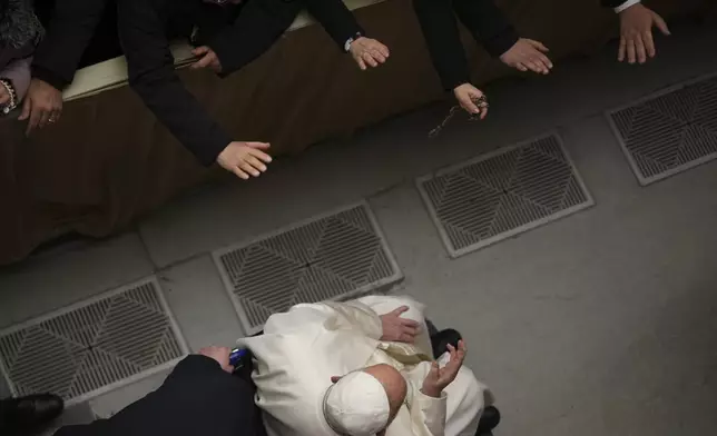 Pope Francis arrives for a Jubilee audience in the Pope Paul VI hall at the Vatican, Saturday, Feb. 1, 2025. (AP Photo/Andrew Medichini)