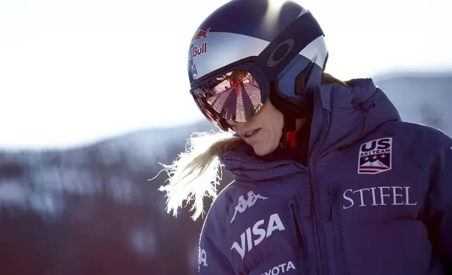 United States' Lindsey Vonn ahead of an alpine ski, women's World Championship downhill training, in Saalbach-Hinterglemm, Austria, Tuesday, Feb. 4, 2025. (AP Photo/Gabriele Facciotti)