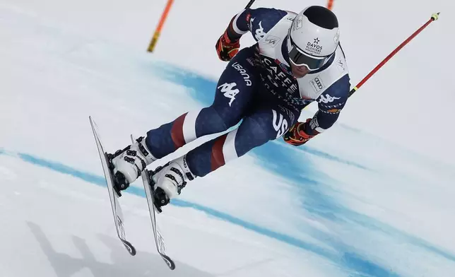 United States' Ryan Cochran Siegle speeds down the course during an alpine ski, men's World Cup downhill, in Crans Montana, Switzerland, Saturday, Feb. 22, 2025. (AP Photo/Gabriele Facciotti)