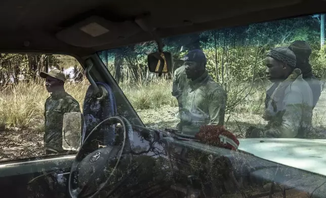 Members of the Lion Intervention Brigade conduct a patrol at Niokolo Koba National Park, Senegal on Tuesday, Jan. 14, 2025. (AP Photo/Annika Hammerschlag)