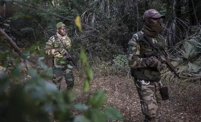 Members of the Lion Intervention Brigade conduct a patrol at Niokolo Koba National Park, Senegal on Tuesday, Jan. 14, 2025. (AP Photo/Annika Hammerschlag)