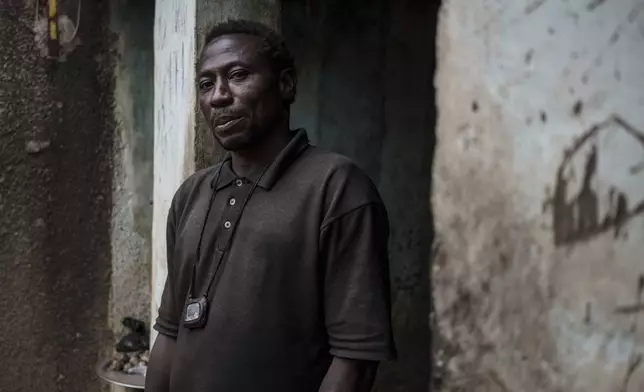 Cheikh Camara, a marabout or influential religious leader, who often prescribes his followers lion skin gris-gris, poses for a portrait in Tambacounda, Senegal on Thursday, Jan. 16, 2025. (AP Photo/Annika Hammerschlag)