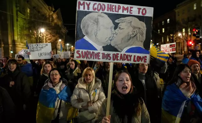 People chant slogans during a demonstration against Russia's war on Ukraine as they mark the third anniversary of the full-scale invasion in Berlin, Monday, Feb. 24, 2025. (AP Photo/Ebrahim Noroozi)